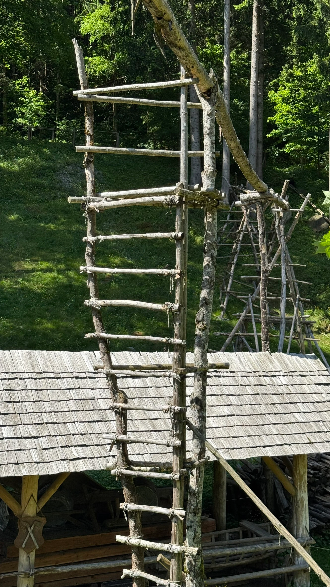 Wooden Aqueduct | Elevated Half Pipes Supported by Posts and Wooden Ladders
