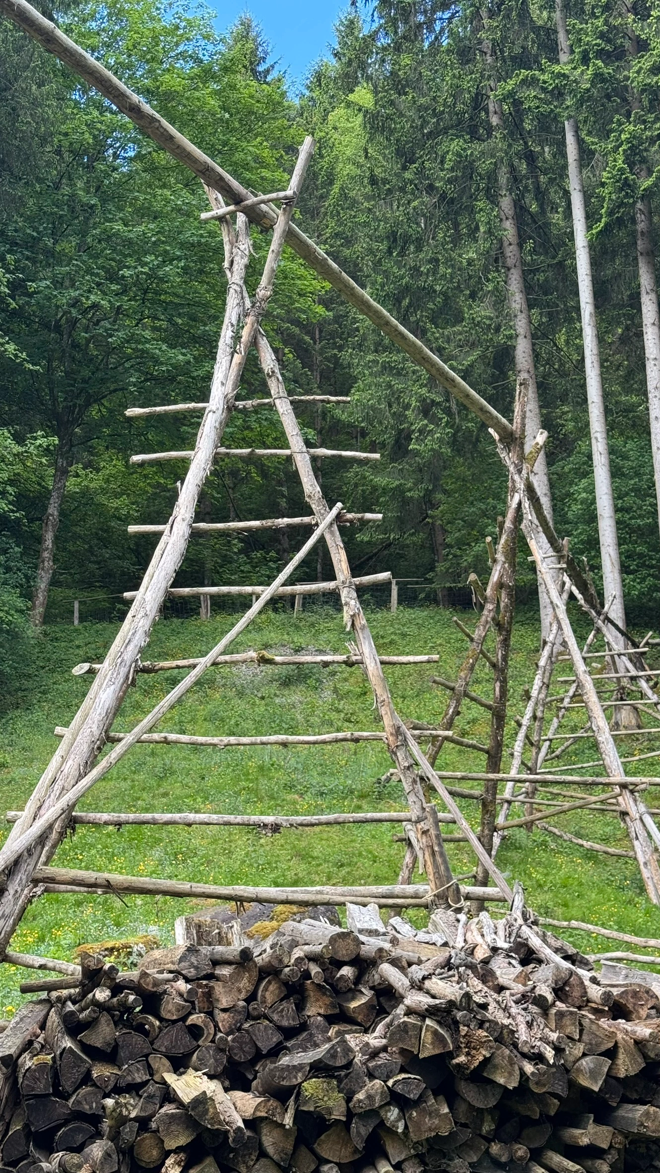 Wooden Aqueduct | Elevated Half Pipes Supported by Posts and Wooden Ladders