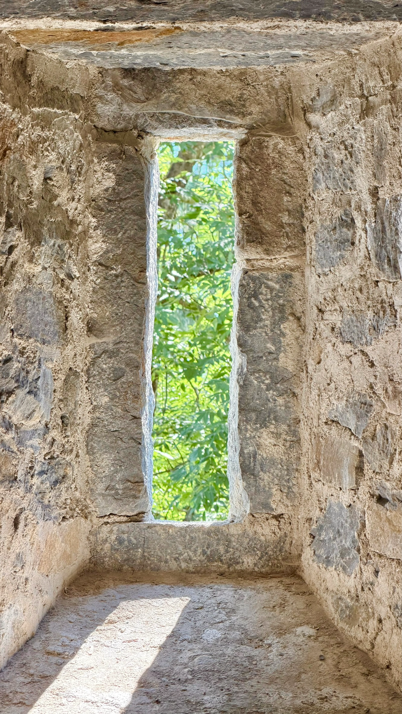 The slit window in the east wall provides light and ventilation for the sleeping chamber.