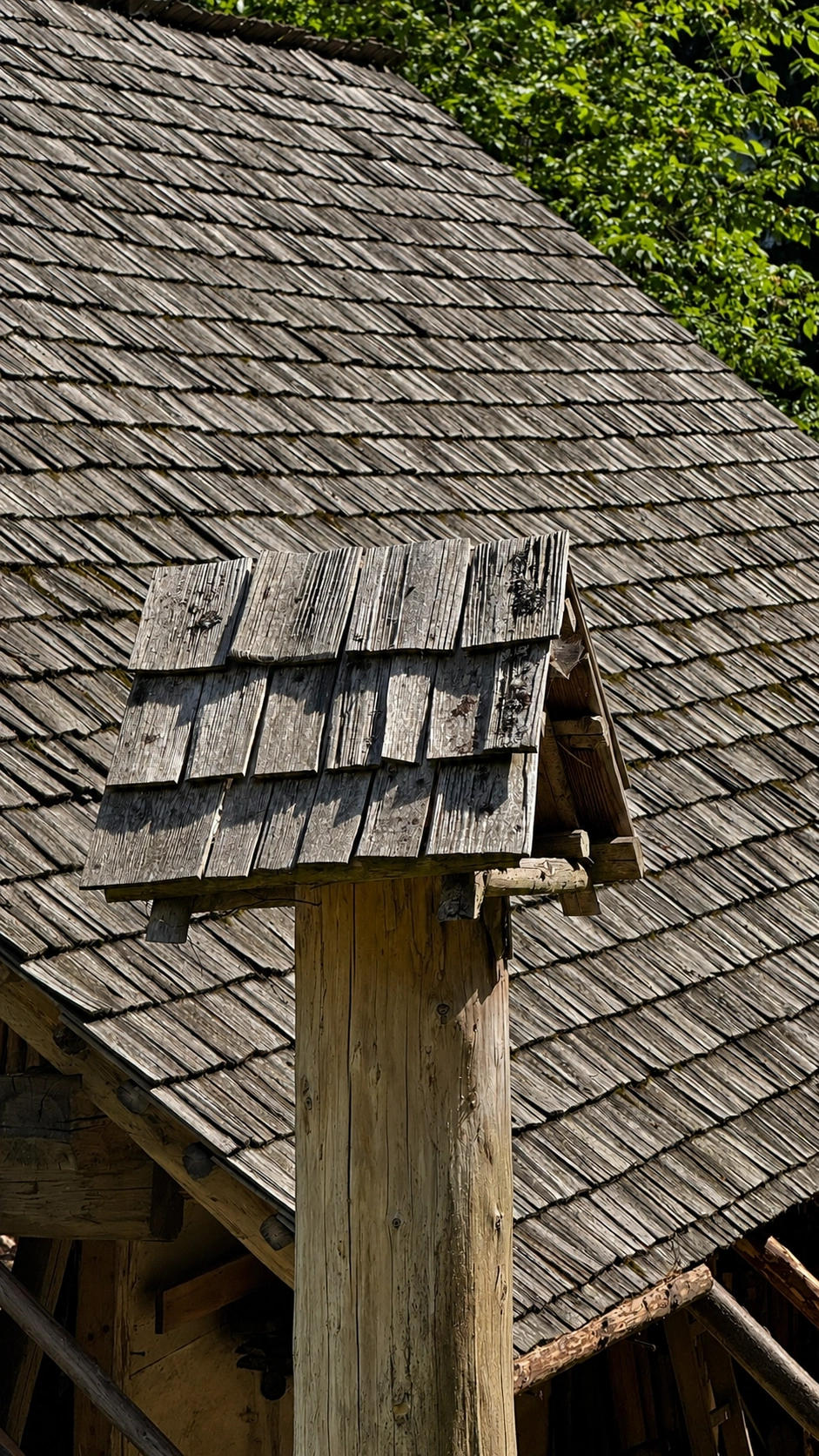 Larch shingles cover the workshop roofs.