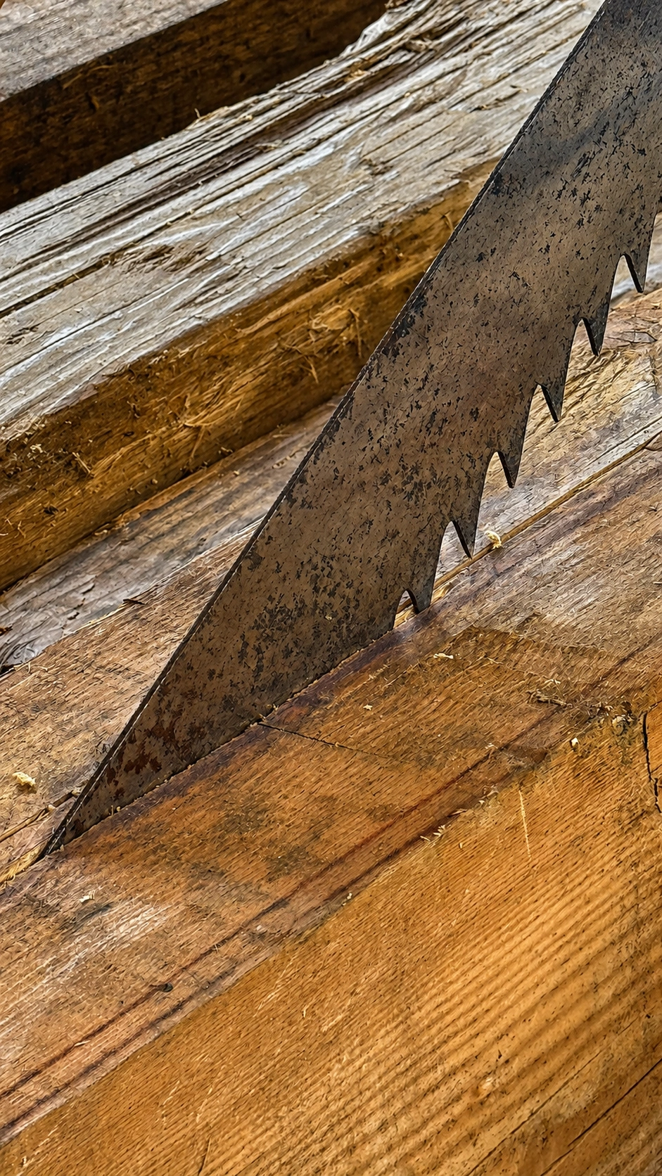 Stroke by stroke, the saw follows the layout marks and results in a straight cut.